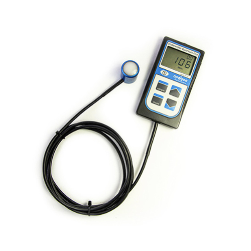 Apogee Par Meter With Cable coiled laying on desk